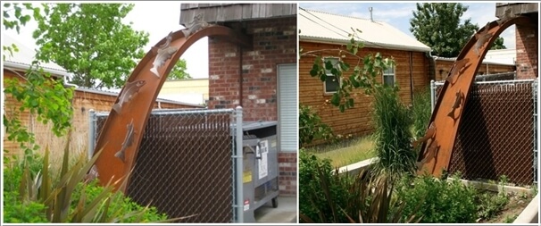 Install a Structure at The Downspout Like This One with Salmon Sculptures