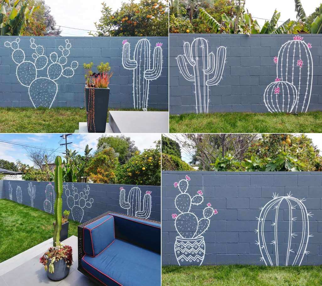 Hand Paint Cactus Drawings In White Over a Slate Colored Wall To Mimic a Chalkboard